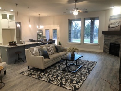 Enjoy entertaining your guests in this bright open living floor on Golf Club At Surrey Hills in Oklahoma - for sale on GolfHomes.com, golf home, golf lot