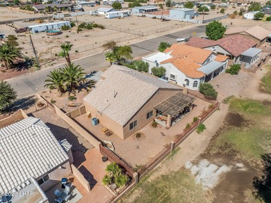 MOVE IN READY!! 3-bedroom, 2 bath, 2-car garage home in the on Desert Lakes Golf Course in Arizona - for sale on GolfHomes.com, golf home, golf lot