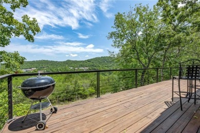 This lake view home on Table Rock Lake is perfect for those who on Holiday Island Executive Golf Course in Arkansas - for sale on GolfHomes.com, golf home, golf lot