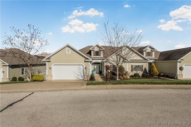 Discover refined lake living at the Villas of Country Club Cove on Seasons Ridge At Four Seasons in Missouri - for sale on GolfHomes.com, golf home, golf lot