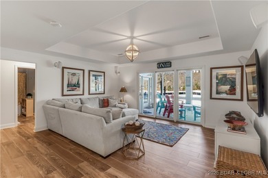 Discover refined lake living at the Villas of Country Club Cove on Seasons Ridge At Four Seasons in Missouri - for sale on GolfHomes.com, golf home, golf lot