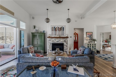 Discover refined lake living at the Villas of Country Club Cove on Seasons Ridge At Four Seasons in Missouri - for sale on GolfHomes.com, golf home, golf lot