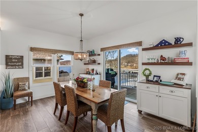 Discover refined lake living at the Villas of Country Club Cove on Seasons Ridge At Four Seasons in Missouri - for sale on GolfHomes.com, golf home, golf lot