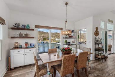 Discover refined lake living at the Villas of Country Club Cove on Seasons Ridge At Four Seasons in Missouri - for sale on GolfHomes.com, golf home, golf lot