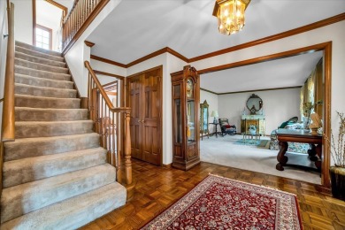 Welcome to this impeccably maintained two-story, all brick on Cantigny Golf and Tennis Club in Illinois - for sale on GolfHomes.com, golf home, golf lot