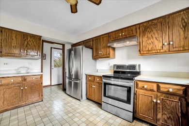 Welcome to this impeccably maintained two-story, all brick on Cantigny Golf and Tennis Club in Illinois - for sale on GolfHomes.com, golf home, golf lot