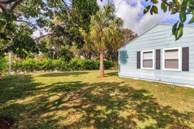 This tastefully renovated home, boasta two spacious bedrooms on West Palm Beach Golf Course in Florida - for sale on GolfHomes.com, golf home, golf lot