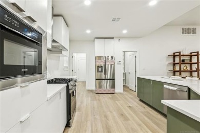 Stunning new construction in a gated golf community. This home on Heritage Hills Golf Course in Oklahoma - for sale on GolfHomes.com, golf home, golf lot
