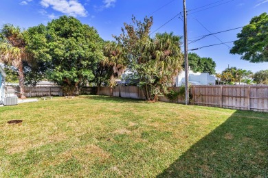 This tastefully renovated home, boasta two spacious bedrooms on West Palm Beach Golf Course in Florida - for sale on GolfHomes.com, golf home, golf lot