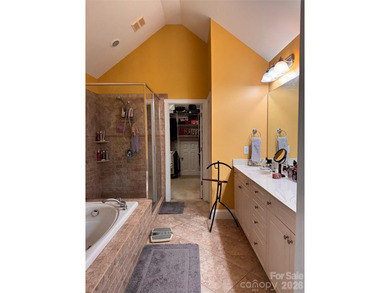 This elegant residence welcomes you with an impressive open on The Divide Golf Club in North Carolina - for sale on GolfHomes.com, golf home, golf lot