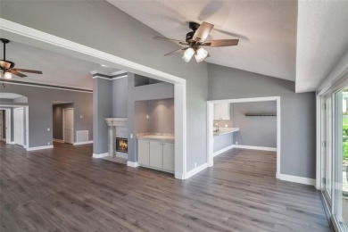 Welcome to your dream villa in the beautiful gated community of on Harbor Hills Country Club in Florida - for sale on GolfHomes.com, golf home, golf lot