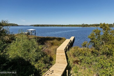 Stunning, waterfront, 3 BR/3BA home with captivating panoramic on Star Hill Golf Club  in North Carolina - for sale on GolfHomes.com, golf home, golf lot