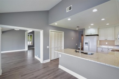 Welcome to your dream villa in the beautiful gated community of on Harbor Hills Country Club in Florida - for sale on GolfHomes.com, golf home, golf lot