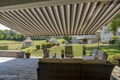 GOLF COURSE, POND, and WATERFALL VIEWS from the back patio on Rarity Bay Country Club - Loudon in Tennessee - for sale on GolfHomes.com, golf home, golf lot