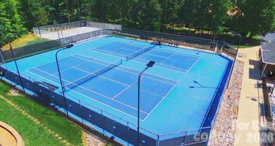 This elegant residence welcomes you with an impressive open on The Divide Golf Club in North Carolina - for sale on GolfHomes.com, golf home, golf lot