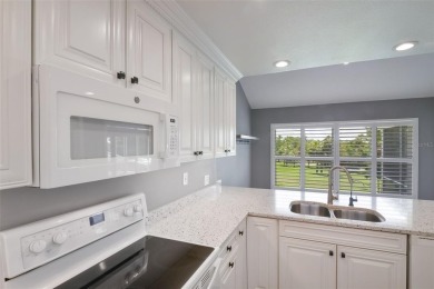 Welcome to your dream villa in the beautiful gated community of on Harbor Hills Country Club in Florida - for sale on GolfHomes.com, golf home, golf lot