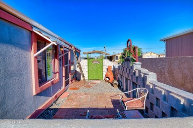 Charming 2-bedroom home featuring a split floor plan and an on The Refuge Golf and Country Club in Arizona - for sale on GolfHomes.com, golf home, golf lot