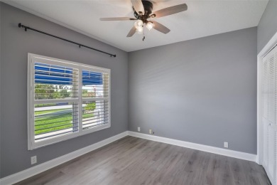 Welcome to your dream villa in the beautiful gated community of on Harbor Hills Country Club in Florida - for sale on GolfHomes.com, golf home, golf lot