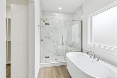 Stunning new construction in a gated golf community. This home on Heritage Hills Golf Course in Oklahoma - for sale on GolfHomes.com, golf home, golf lot