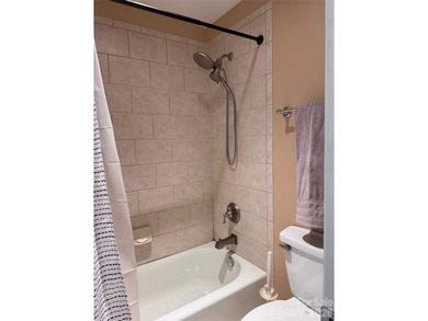 This elegant residence welcomes you with an impressive open on The Divide Golf Club in North Carolina - for sale on GolfHomes.com, golf home, golf lot