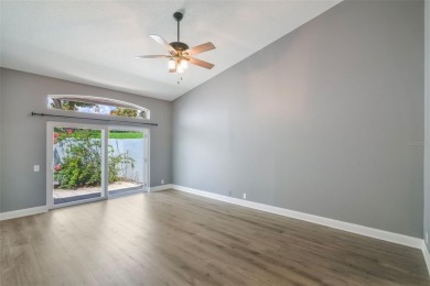 Welcome to your dream villa in the beautiful gated community of on Harbor Hills Country Club in Florida - for sale on GolfHomes.com, golf home, golf lot