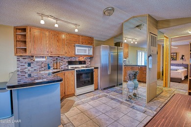 Charming 2-bedroom home featuring a split floor plan and an on The Refuge Golf and Country Club in Arizona - for sale on GolfHomes.com, golf home, golf lot