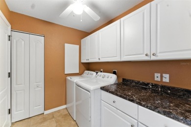 Welcome to a thoughtfully designed home in the desirable Rotonda on Rotonda Golf and Country Club The Palms Course in Florida - for sale on GolfHomes.com, golf home, golf lot