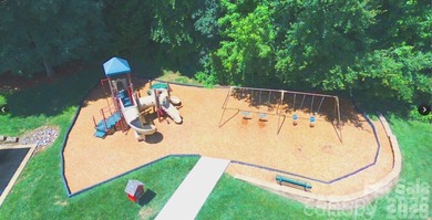 This elegant residence welcomes you with an impressive open on The Divide Golf Club in North Carolina - for sale on GolfHomes.com, golf home, golf lot