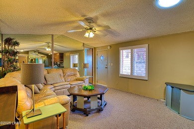 Charming 2-bedroom home featuring a split floor plan and an on The Refuge Golf and Country Club in Arizona - for sale on GolfHomes.com, golf home, golf lot