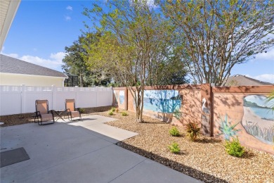 This meticulously maintained 2/2 Block/Stucco WOODLAWN Courtyard on The Links of Spruce Creek in Florida - for sale on GolfHomes.com, golf home, golf lot