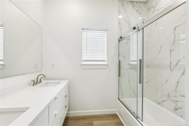 Stunning new construction in a gated golf community. This home on Heritage Hills Golf Course in Oklahoma - for sale on GolfHomes.com, golf home, golf lot