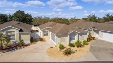This meticulously maintained 2/2 Block/Stucco WOODLAWN Courtyard on The Links of Spruce Creek in Florida - for sale on GolfHomes.com, golf home, golf lot