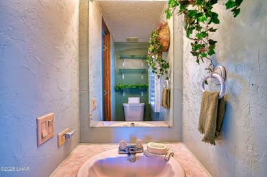 Charming 2-bedroom home featuring a split floor plan and an on The Refuge Golf and Country Club in Arizona - for sale on GolfHomes.com, golf home, golf lot