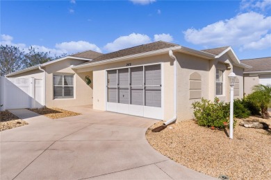 This meticulously maintained 2/2 Block/Stucco WOODLAWN Courtyard on The Links of Spruce Creek in Florida - for sale on GolfHomes.com, golf home, golf lot