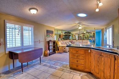 Charming 2-bedroom home featuring a split floor plan and an on The Refuge Golf and Country Club in Arizona - for sale on GolfHomes.com, golf home, golf lot