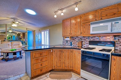 Charming 2-bedroom home featuring a split floor plan and an on The Refuge Golf and Country Club in Arizona - for sale on GolfHomes.com, golf home, golf lot