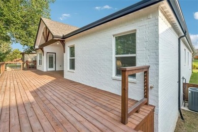 Stunning new construction in a gated golf community. This home on Heritage Hills Golf Course in Oklahoma - for sale on GolfHomes.com, golf home, golf lot