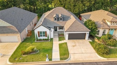 Stunning new construction in a gated golf community. This home on Heritage Hills Golf Course in Oklahoma - for sale on GolfHomes.com, golf home, golf lot