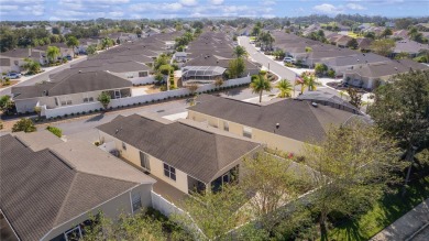 This meticulously maintained 2/2 Block/Stucco WOODLAWN Courtyard on The Links of Spruce Creek in Florida - for sale on GolfHomes.com, golf home, golf lot