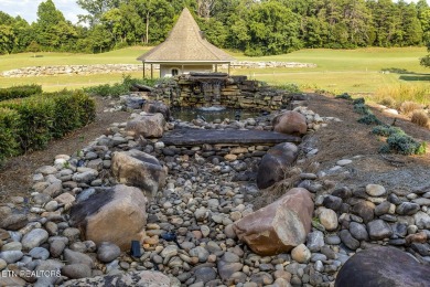 GOLF COURSE, POND, and WATERFALL VIEWS from the back patio on Rarity Bay Country Club - Loudon in Tennessee - for sale on GolfHomes.com, golf home, golf lot