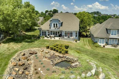 GOLF COURSE, POND, and WATERFALL VIEWS from the back patio on Rarity Bay Country Club - Loudon in Tennessee - for sale on GolfHomes.com, golf home, golf lot