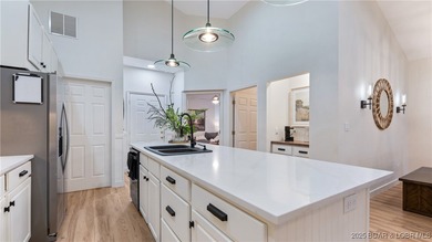 This is Old Kinderhook living, perfected. Morning light pours on The Club At Old Kinderhook in Missouri - for sale on GolfHomes.com, golf home, golf lot