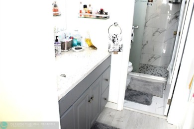 LARGE 2 BEDROOM, 2 BATHROOM UNIT. FEATURES SCREENED BALCONY on Inverrary Country Club in Florida - for sale on GolfHomes.com, golf home, golf lot
