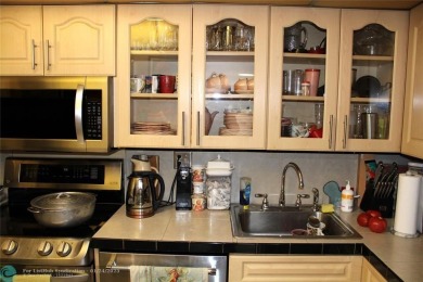 LARGE 2 BEDROOM, 2 BATHROOM UNIT. FEATURES SCREENED BALCONY on Inverrary Country Club in Florida - for sale on GolfHomes.com, golf home, golf lot