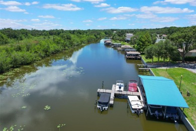 Welcome to your dream villa in the beautiful gated community of on Harbor Hills Country Club in Florida - for sale on GolfHomes.com, golf home, golf lot
