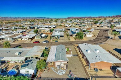 Charming 2-bedroom home featuring a split floor plan and an on The Refuge Golf and Country Club in Arizona - for sale on GolfHomes.com, golf home, golf lot