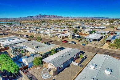 Charming 2-bedroom home featuring a split floor plan and an on The Refuge Golf and Country Club in Arizona - for sale on GolfHomes.com, golf home, golf lot