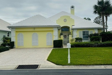 This stunning Bermuda inspired Paget model offers a perfect on Oak Harbor Country Club in Florida - for sale on GolfHomes.com, golf home, golf lot