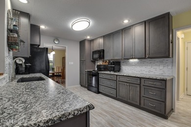 Beautifully updated ranch-style home located in the Toqua on Toqua Golf Course - Loudon County in Tennessee - for sale on GolfHomes.com, golf home, golf lot