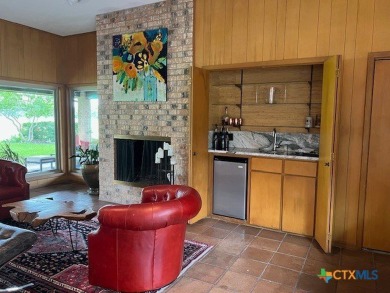 Welcome to your dream home-an exquisite mid-century modern on Victoria Country Club in Texas - for sale on GolfHomes.com, golf home, golf lot
